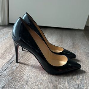 CHRISTIAN LOUBOUTIN
Decollete 85mm Patent Leather Red Sole Pumps